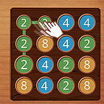 나무 판자 위에 숫자 2, 4, 8이 적힌 다양한 색의 원들이 배열되어 있고, 손 모양이 숫자 2를 연결하고 있다