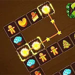 배경에 다양한 모양의 쿠키와 케이크 아이콘이 있는 퍼즐 게임 인터페이스