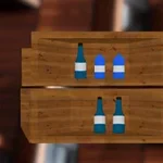 나무 선반 위에 파란색과 흰색이 어우러진 병과 박스가 놓여 있는 모습