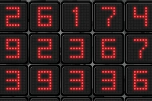 검은색 배경에 빨간색 LED 숫자가 배열된 이미지