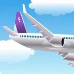 파란 하늘을 배경으로 구름 사이를 나는 비행기