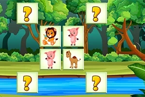 숲 배경에 동물 그림이 그려진 카드와 물음표 카드가 배열되어 있는 이미지