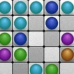 다양한 색상의 구슬들이 격자 무늬 바탕 위에 배열되어 있는 모습