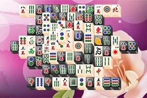 다양한 그림과 기호가 그려진 마작 타일이 꽃무늬 배경 위에 쌓여 있는 모습