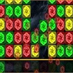 빨간색, 녹색, 노란색의 소용돌이 모양 패턴이 반복된 블록들이 배열된 이미지