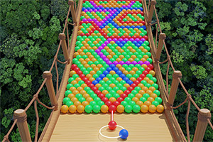 다리 위에 다양한 색상의 공들이 패턴을 이루며 배열되어 있는 모습