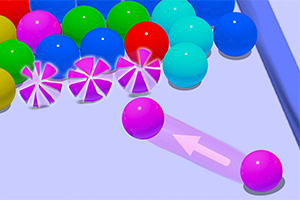 다양한 색상의 공들이 모여 있고, 보라색 공이 화살표와 함께 오른쪽으로 이동하는 모습