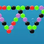 파란 배경 위에 다양한 색상의 작은 구슬들이 역삼각형 모양으로 배열되어 있다