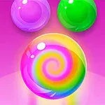 분홍색 배경 위에 무지개 색상의 소용돌이 문양이 있는 구슬과 두 개의 다른 컬러 구슬