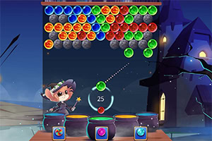 마법사가 다채로운 공을 겨냥하고 쏘는 장면과 어두운 성이 배경으로 있는 이미지