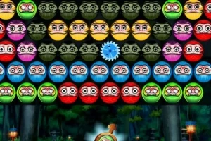 다양한 색상의 정면을 바라보는 얼굴 모양 구슬들이 여러 줄로 늘어서 있는 이미지