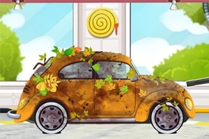 더럽고 나뭇잎이 붙어 있는 노란색 빈티지 차가 세차장에 있는 모습