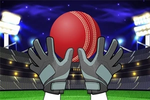 야구장에서 장갑을 낀 손이 빨간 공을 잡으려는 모습