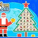 산타클로스가 선물을 들고 크리스마스트리 옆에 서 있는 이미지