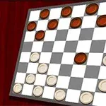 체스판 모양의 바둑판 위에 검은색과 흰색의 둥근 말들이 배치되어 있습니다