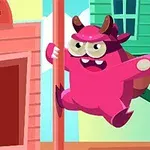 핑크색 뿔 달린 괴물이 건물 앞 기둥을 오르는 장면