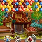 알록달록한 구슬이 화면 상단에 모여 있고, 하단에는 전통적인 건물과 상점 배경이 있으며 여러 굴림 아이콘이 배열되어 있습니다