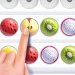 과일 모양 아이콘들이 배열된 판에 손가락이 사과 모양 아이콘을 터치하고 있습니다