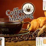 커피 한 잔, 커피 원두, 크루아상과 함께 여러 타일로 둘러싸인 장면