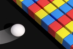 검정 배경 위에 흰색 공이 컬러풀한 빨강, 노랑, 파랑 블록들 쪽으로 굴러가는 모습
