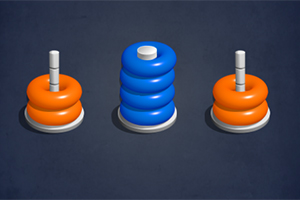 세 개의 기둥 위에 주황색과 파란색 링이 쌓여 있는 모습