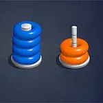 세 개의 기둥 위에 주황색과 파란색 링이 쌓여 있는 모습