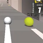 회색 도로 위에 흰색 공과 노란색 공이 나란히 있는 모습