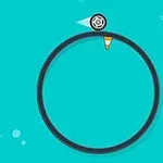 하늘색 배경 위에 검은 색 테두리의 원과 그 위에 놓인 공, 작은 트라이앵글 모양 장식