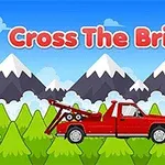 빨간 견인차가 산과 나무가 있는 배경 앞에 서 있는 모습