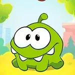 초록색 캐릭터가 숲속에 앉아 있는 모습