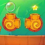 초록색 귀여운 캐릭터가 나무 판 위에 앉아 있고, 두 개의 노란색 소용돌이 모양 튜브와 별 두 개, 비눗방울이 있는 장면