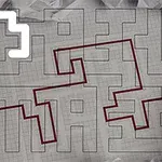 격자무늬 종이 위에 미로를 풀며 빨간 선으로 경로를 그리는 손