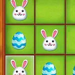 초록색 배경의 격자에 토끼 얼굴과 파란 줄무늬 달걀 여러 개가 배치된 모습