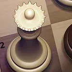 흰색과 검은색 체스 말이 체스판 위에 배치되어 있는 모습