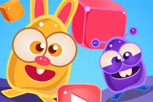 화려한 색상의 귀여운 토끼 모양과 외계 생명체 캐릭터가 다양한 색상의 큐브와 함께 등장합니다