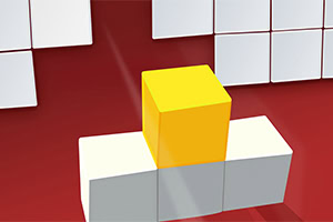 노란색 큐브가 빨간색 배경 위에 놓인 흰색 큐브 두 개 위에 있는 모습