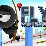 검은색 캐릭터가 밧줄을 타고 하늘을 나는 모습과 함께 뒤편에 고층 빌딩과 다리가 보이는 이미지