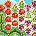 과일 캐릭터가 있는 육각형 타일로 구성된 퍼즐 보드