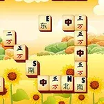 노란 해바라기 밭을 배경으로 한 중첩된 마작 타일