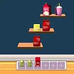 선반 위에 우유팩, 커피, 음료 등이 놓여 있는 장면