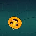 웃는 표정의 귀여운 호박이 있는 어두운 벽 배경