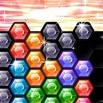 다양한 색상의 육각형 블록들이 배열되어 있고 손가락이 오른쪽에서 블록을 가리키는 모습