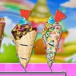 세 가지 다양한 아이스크림 콘이 나란히 놓여 있으며 각각 파란색 크림과 빨간 과일 조각으로 장식되어 있다