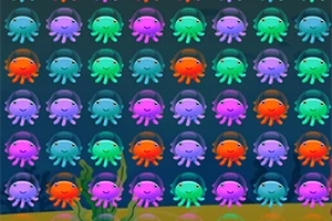 알록달록한 색상의 작은 문어들이 해저에 줄지어 있는 이미지