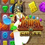 다양한 보석 블록들이 격자에 배치되어 있고, 중앙에는 이집트 테마의 캐릭터와 로고가 있는 이미지