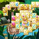 화면에는 다양한 보석과 무늬가 있는 타일이 정글 배경과 함께 쌓여 있으며, 빛나는 타일이 눈에 띄는 이미지입니다