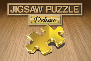 Jigsaw Puzzle Deluxe라는 텍스트 아래에 황금색 퍼즐 조각이 빛나고 있는 이미지