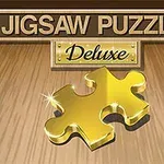 Jigsaw Puzzle Deluxe라는 텍스트 아래에 황금색 퍼즐 조각이 빛나고 있는 이미지