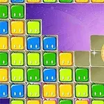 다양한 색상의 블록들이 쌓여 있으며, 보라색 배경에 하이라이트 효과가 있는 이미지