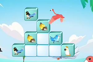 새들이 그려진 블록이 계단 모양으로 쌓여 있고 하늘을 배경으로 플라밍고가 날고 있다